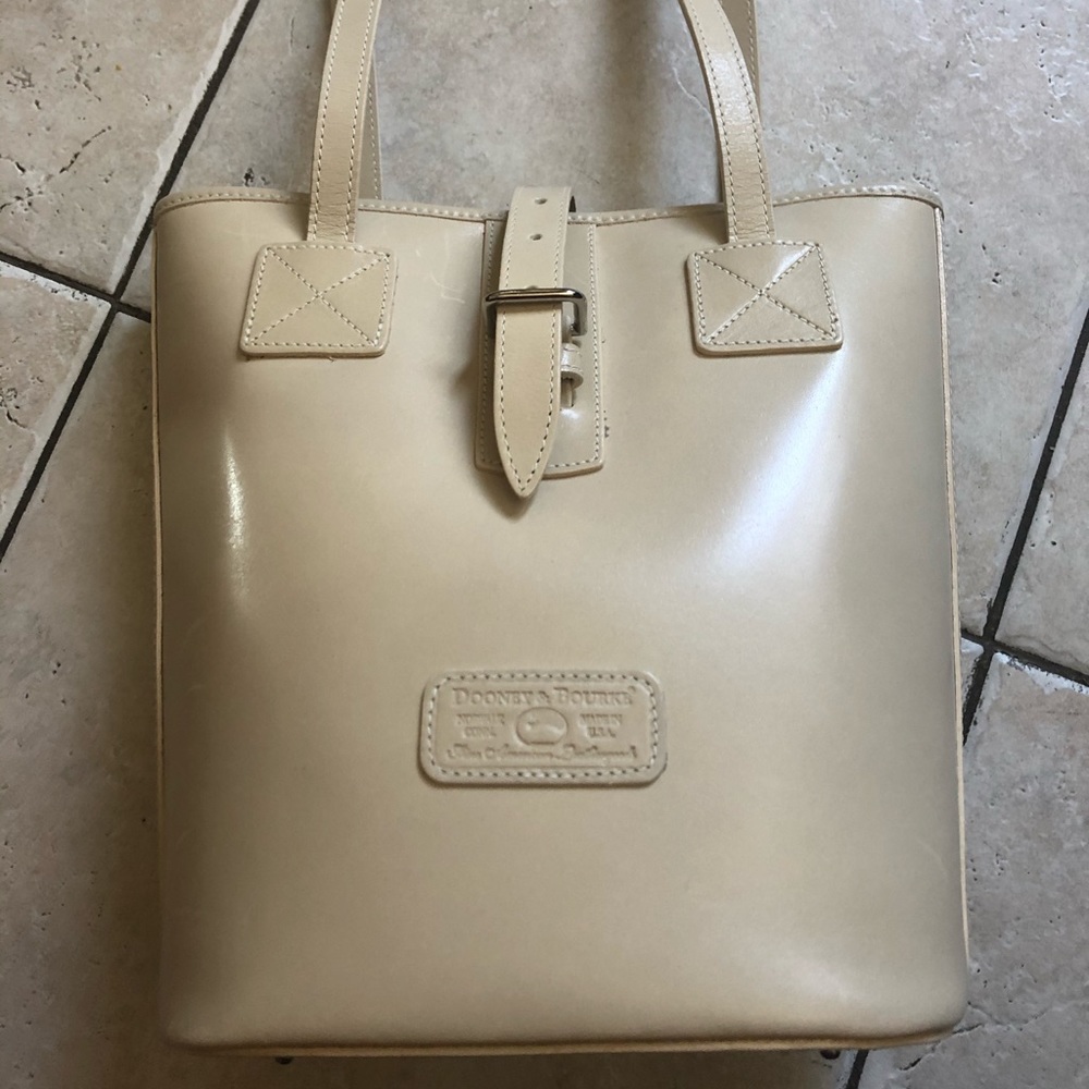 Dooney and Bourke ivory leather bucket bag